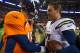 DENVER, CO - DECEMBER 12: Quarterback Peyton Manning #18 of the Denver Broncos congratulates quarterback Philip Rivers #17 of the San Diego Chargers after a 27-20 loss to the San Diego Chargers at Sports Authority Field Field at Mile High on December 12, 2013 in Denver, Colorado. (Photo by Dustin Bradford/Getty Images)