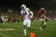 PASADENA, CA - JANUARY 06: Quarterback Nick Marshall #14 of the Auburn Tigers runs for a four-yard touchdown in the 2014 Vizio BCS National Championship Game against the Florida State Seminoles at the Rose Bowl on January 6, 2014 in Pasadena, California. (Photo by Jeff Gross/Getty Images)