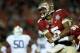 PASADENA, CA - JANUARY 06: Quarterback Jameis Winston #5 of the Florida State Seminoles celebrates after a 2-yard pass for a touchdown to take a 33-31 lead over the Auburn Tigers in the final moments of the fourth quarter during the 2014 Vizio BCS National Championship Game at the Rose Bowl on January 6, 2014 in Pasadena, California. Florida State lead 34-31 after a successful extra point. (Photo by Stephen Dunn/Getty Images)