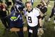 Dec 2, 2013; Seattle, WA, USA; Seattle Seahawks quarterback Russell Wilson (3) and New Orleans Saints quarterback Drew Brees (9) shake hands after the game at CenturyLink Field. Seattle defeated New Orleans 34-7. Mandatory Credit: Steven Bisig-USA TODAY Sports
