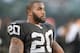 OAKLAND, CA - DECEMBER 29: Darren McFadden #20 of the Oakland Raiders looks on from the sidelines against the Denver Broncos during the fourth quarter at O.co Coliseum on December 29, 2013 in Oakland, California. The Broncos won the game 34-14. (Photo by Thearon W. Henderson/Getty Images)