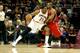 CLEVELAND, OH - DECEMBER 26: Andrew Bynum #21 of the Cleveland Cavaliers handles the ball against Al Horford #15 of the Atlanta Hawks in the first half at Quicken Loans Arena on December 26, 2013 in Cleveland, Ohio. NOTE TO USER: User expressly acknowledges and agrees that, by downloading and/or using this photograph, user is consenting to the terms and conditions of the Getty Images License Agreement. (Photo by Mike Lawrie/Getty Images)