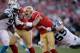 Luke Kuechly leads a talented defense that could give Colin Kaepernick fits in the Divisional Round clash.