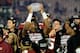 PASADENA, CA - JANUARY 06: Quarterback Jameis Winston #5 of the Florida State Seminoles holds the Coaches' Trophy after defeating the Auburn Tigers 34-31 in the 2014 Vizio BCS National Championship Game at the Rose Bowl on January 6, 2014 in Pasadena, California. (Photo by Harry How/Getty Images)