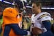DENVER, CO - DECEMBER 12: Quarterback Peyton Manning #18 of the Denver Broncos congratulates quarterback Philip Rivers #17 of the San Diego Chargers after a 27-20 loss to the San Diego Chargers at Sports Authority Field Field at Mile High on December 12, 2013 in Denver, Colorado. (Photo by Dustin Bradford/Getty Images)
