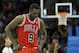 Nov 30, 2013; Cleveland, OH, USA; Chicago Bulls small forward Luol Deng (9) walks to the bench during a timeout in the fourth quarter against the Cleveland Cavaliers at Quicken Loans Arena. Mandatory Credit: David Richard-USA TODAY Sports