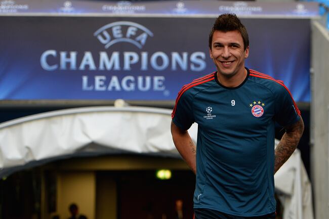 Hi-res-182597879-mario-mandzukic-of-fc-bayern-muenchen-walks-out-of-the_crop_north