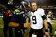 SEATTLE, WA - DECEMBER 02: Quarterback Russell Wilson #3 of the Seattle Seahawks and quarterback Drew Brees #9 of the New Orleans Saints meet on the field after the Seattle Seahawks defeated the New Orleans Saints 34-7 in a game at CenturyLink Field on December 2, 2013 in Seattle, Washington. (Photo by Jonathan Ferrey/Getty Images)