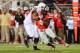 COLUMBUS, OH - OCTOBER 26: Noah Spence #8 of the Ohio State Buckeyes rushes against the Penn State Nittany Lions at Ohio Stadium on October 26, 2013 in Columbus, Ohio. (Photo by Jamie Sabau/Getty Images)