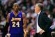 January 4, 2013; Los Angeles, CA, USA; Los Angeles Lakers head coach Mike D'Antoni speaks to shooting guard Kobe Bryant (24) during a stoppage in play against the Los Angeles Clippers during the second half at Staples Center. Mandatory Credit: Gary A. Vasquez-USA TODAY Sports
