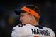 December 29, 2013; Oakland, CA, USA; Denver Broncos quarterback Peyton Manning (18) watches from the sideline during the fourth quarter against the Oakland Raiders at O.co Coliseum. The Broncos defeated the Raiders 34-14. Mandatory Credit: Kyle Terada-USA TODAY Sports