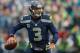 SEATTLE, WA - DECEMBER 29: Quarterback Russell Wilson #3 of the Seattle Seahawks looks downfield to pass against the St. Louis Rams at CenturyLink Field on December 29, 2013 in Seattle, Washington. (Photo by Otto Greule Jr/Getty Images)