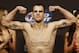 Aug 16, 2013; Boston, MA, USA; Cole Miller poses during the weigh-in for his UFC fight at TD Garden. Mandatory Credit: Winslow Townson-USA TODAY Sports