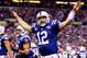 INDIANAPOLIS, IN - JANUARY 04: Quarterback Andrew Luck #12 of the Indianapolis Colts celebrates a fourth quarter touchdown against the Kansas City Chiefs during a Wild Card Playoff game at Lucas Oil Stadium on January 4, 2014 in Indianapolis, Indiana. (Photo by Andy Lyons/Getty Images)