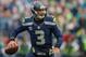 SEATTLE, WA - DECEMBER 29: Quarterback Russell Wilson #3 of the Seattle Seahawks looks downfield to pass against the St. Louis Rams at CenturyLink Field on December 29, 2013 in Seattle, Washington. (Photo by Otto Greule Jr/Getty Images)