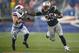 FOXBORO, MA - DECEMBER 29: LeGarrette Blount #29 of the New England Patriots stiff arms Jim Leonhard #35 of the Buffalo Bills on his way to a touchdown in the fourth quarter during the game at Gillette Stadium on December 29, 2013 in Foxboro, Massachusetts. (Photo by Jared Wickerham/Getty Images)