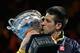 MELBOURNE, AUSTRALIA - JANUARY 27: Novak Djokovic of Serbia holds the Norman Brookes Challenge Cup after winning his men's final match against Andy Murray of Great Britain during day fourteen of the 2013 Australian Open at Melbourne Park on January 27, 2013 in Melbourne, Australia. (Photo by Julian Finney/Getty Images)