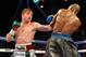 Sep 14, 2013; Las Vegas, NV, USA; Floyd Mayweather Jr. (blue gloves) and Canelo Alvarez battle it during their during their WBC and WBA super welterweight titles fight at MGM Grand Garden Arena. Mandatory Credit: Jayne Kamin-Oncea-USA TODAY Sports