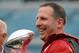 Jan 1, 2014; Jacksonville, FL, USA; Nebraska Cornhuskers head coach Bo Pelini with the trophy after the game against the Georgia Bulldogs at EverBank Field . Mandatory Credit: Melina Vastola-USA TODAY Sports