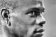 MILAN, ITALY - AUGUST 28: (EDITORS NOTE: Image has been converted to black and white.) Mario Balotelli of AC Milan during the UEFA Champions League Play-off Second Leg match between AC Milan v PSV Eindhoven at Stadio Giuseppe Meazza on August 28, 2013 in Milan, Italy. (Photo by Claudio Villa/Getty Images)