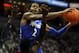 Jan 9, 2014; Louisville, KY, USA; Memphis Tigers forward Shaq Goodwin (2) shoots against Louisville Cardinals forward Montrezl Harrell (24) during the first half at the KFC Yum! Center. Mandatory Credit: Jamie Rhodes-USA TODAY Sports