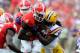 Sep 28, 2013; Athens, GA, USA; Georgia Bulldogs running back Keith Marshall (4) is tackled by LSU Tigers linebacker Lamin Barrow (18) during the second quarter at Sanford Stadium. Mandatory Credit: Dale Zanine-USA TODAY Sports