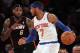 Jan 9, 2014; New York, NY, USA; New York Knicks small forward Carmelo Anthony (7) controls the ball against Miami Heat small forward LeBron James (6) during the first quarter of a game at Madison Square Garden. Mandatory Credit: Brad Penner-USA TODAY Sports
