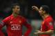 DERBY, UNITED KINGDOM - FEBRUARY 15: Cristiano Ronaldo of Manchester United is congratulated by Rio Ferdinand after scoring the third goal during the FA Cup sponsored by E.on Fifth Round match between Derby County and Manchester United at Pride Park on February 15, 2009 in Derby, England. (Photo by Laurence Griffiths/Getty Images)