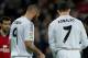 MADRID, SPAIN - JANUARY 09: Jese Rodriguez (2ndR) of Real Madrid CF grimaces in pain after bneing tackled surrounded by his teammates Karim Benzema (L), Cristiano Ronaldo (2ndL) and referee Pedro Jesus Perez Montero (R) during the Copa del Rey Round of 8 first match between Real Madrid and CA Osasuna at Estadio Santiago Bernabeu on January 9, 2014 in Madrid, Spain. (Photo by Gonzalo Arroyo Moreno/Getty Images)