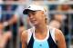 SYDNEY, AUSTRALIA - JANUARY 07: Caroline Wozniacki of Denmark looks dejected after losing a point in her match against Lucie Safarova of the Czech Republic during day three of the 2014 Sydney International at Sydney Olympic Park Tennis Centre on January 7, 2014 in Sydney, Australia. (Photo by Mark Nolan/Getty Images)