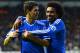 DERBY, ENGLAND - JANUARY 05: Willian of Chelsea (R) congratulates Oscar of Chelsea on scoring their second goal during the Budweiser FA Cup Third Round match between Derby County and Chelsea at iPro Stadium on January 5, 2014 in Derby, England. (Photo by Michael Regan/Getty Images)