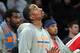 Jan 9, 2014; New York, NY, USA; New York Knicks shooting guard J.R. Smith (8) watches the final seconds of the game from the bench during the fourth quarter of a game against the Miami Heat at Madison Square Garden. Smith didn't play in the game. Mandatory Credit: Brad Penner-USA TODAY Sports