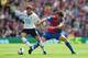 LONDON, ENGLAND - AUGUST 18: Roberto Soldado of Tottenham Hotspur is tackled by Mile Jedinak of Crystal Palace during the Barclays Premier League match between Crystal Palace and Tottenham Hotspur at Selhurst Park on Augsut 18, 2013 in London, England. (Photo by Jamie McDonald/Getty Images)