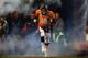 DENVER, CO - DECEMBER 12: Quarterback Peyton Manning #18 of the Denver Broncos emerges from the tunnel during player introductions before a game against the San Diego Chargers at Sports Authority Field Field at Mile High on December 12, 2013 in Denver, Colorado. (Photo by Dustin Bradford/Getty Images)
