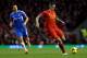LIVERPOOL, ENGLAND - JANUARY 01: Daniel Agger of Liverpool moves away from Robert Koren of Hull City during the Barclays Premier League match between Liverpool and Hull City at Anfield on January 1, 2014 in Liverpool, England. (Photo by Clive Brunskill/Getty Images)
