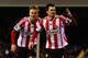 LONDON, ENGLAND - JANUARY 11: Adam Johnson (R) of Sunderland celebrates with team mate Sebastian Larsson (L) after scoring a hat trick during the Barclays Premier League match between Fulham and Sunderland at Craven Cottage on January 11, 2014 in London, England. (Photo by Clive Rose/Getty Images)