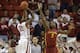 Jan 11, 2014; Norman, OK, USA; Oklahoma Sooners forward Cameron Clark (21) shoots over Iowa State Cyclones forward Melvin Ejim (3) in the first half at Lloyd Noble Center. Mandatory Credit: Tim Heitman-USA TODAY Sports