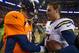 DENVER, CO - DECEMBER 12: Quarterback Peyton Manning #18 of the Denver Broncos congratulates quarterback Philip Rivers #17 of the San Diego Chargers after a 27-20 loss to the San Diego Chargers at Sports Authority Field Field at Mile High on December 12, 2013 in Denver, Colorado. (Photo by Dustin Bradford/Getty Images)