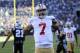 Jan 12, 2014; Charlotte, NC, USA; San Francisco 49ers quarterback Colin Kaepernick (7) celebrates a touchdown against the Carolina Panthers during the third quarter of the 2013 NFC divisional playoff football game at Bank of America Stadium. Mandatory Credit: Sam Sharpe-USA TODAY Sports
