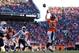 DENVER, CO - JANUARY 12: Wes Welker #83 of the Denver Broncos completes a second quarter touchdown pass against the San Diego Chargers during the AFC Divisional Playoff Game at Sports Authority Field at Mile High on January 12, 2014 in Denver, Colorado. (Photo by Justin Edmonds/Getty Images)