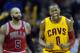 Nov 30, 2013; Cleveland, OH, USA; Cleveland Cavaliers shooting guard C.J. Miles (0) celebrates in front of Chicago Bulls power forward Carlos Boozer (5) in the third quarter at Quicken Loans Arena. Mandatory Credit: David Richard-USA TODAY Sports