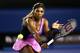 MELBOURNE, AUSTRALIA - JANUARY 13: Serena Williams of the United States plays a backhand in her first round match against Ashleigh Barty of Australia during day one of the 2014 Australian Open at Melbourne Park on January 13, 2014 in Melbourne, Australia. (Photo by Cameron Spencer/Getty Images)