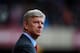 LONDON, ENGLAND - DECEMBER 26: Arsene Wenger manager of Arsenal looks on prior to the Barclays Premier League match between West Ham United and Arsenal at Boleyn Ground on December 26, 2013 in London, England. (Photo by Bryn Lennon/Getty Images)