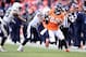 Jan 12, 2014; Denver, CO, USA; Denver Broncos wide receiver Demaryius Thomas (88) is pushed out of bounds by San Diego Chargers cornerback Richard Marshall (31) in the second quarter during the 2013 AFC divisional playoff football game at Sports Authority Field at Mile High. Mandatory Credit: Ron Chenoy-USA TODAY Sports
