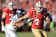 SAN FRANCISCO, CA - DECEMBER 08: Colin Kaepernick #7 of the San Francisco 49ers scrambling with the ball gets grabbed by his jersey from Bobby Wagner #54 of the Seattle Seahawks during the first quarter at Candlestick Park on December 8, 2013 in San Francisco, California. (Photo by Thearon W. Henderson/Getty Images)