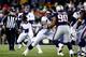 FOXBORO, MA - NOVEMBER 24: Quarterback Peyton Manning #18 of the Denver Broncos looks to pass against the New England Patriots during a game at Gillette Stadium on November 24, 2013 in Foxboro, Massachusetts. (Photo by Jared Wickerham/Getty Images)