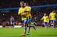 BIRMINGHAM, ENGLAND - JANUARY 13: Jack Wilshere of Arsenal ceelbrates scoring the opening goal with Serge Gnabry of Arsenal during the Barclays Premier League match between Aston Villa and Arsenal at Villa Park on January 13, 2014 in Birmingham, England. (Photo by Michael Regan/Getty Images)