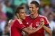 ELCHE, SPAIN - JULY 31: Rodrigo (L) of Benfica celebrates with his teammate Matic during a friendly match between Elche CF and Benfica at Estadio Martinez Valero on July 31, 2013 in Elche, Spain. (Photo by Manuel Queimadelos Alonso/Getty Images)