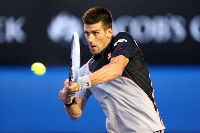 Hi-res-462338883-novak-djokovic-of-serbia-plays-a-backhand-in-his-first_crop_north