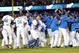 Oct 7, 2013; Los Angeles, CA, USA; The Los Angeles Dodgers celebrate defeating the Atlanta Braves 3-2 in game four of the National League divisional series at Dodger Stadium. Dodgers won 3-2. Mandatory Credit: Jayne Kamin-Oncea-USA TODAY Sports